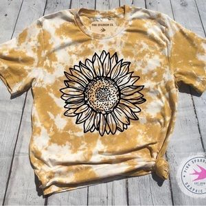 Acid washed screen printed sunflower graphic tee.